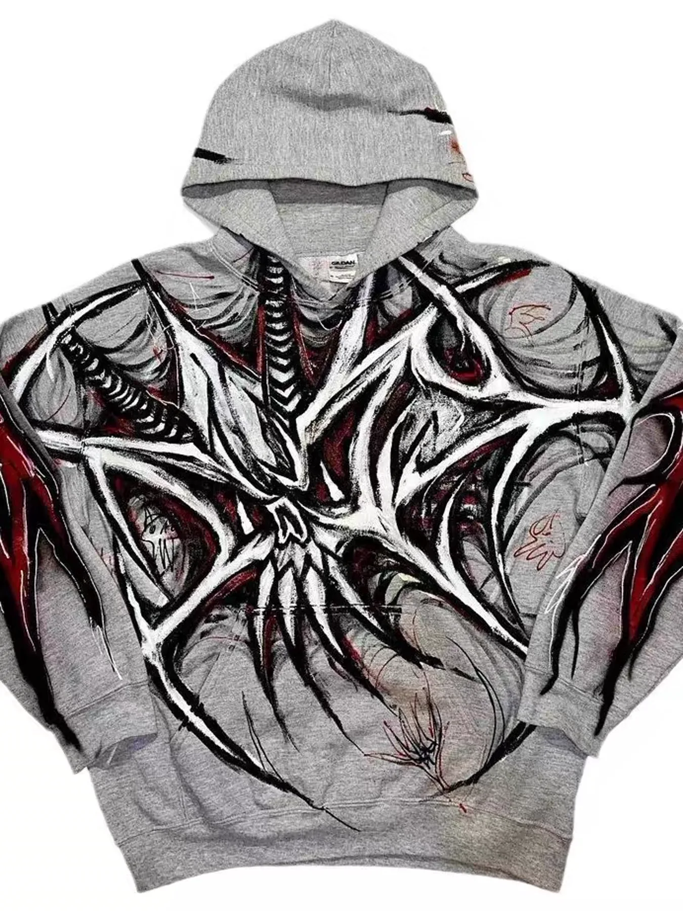 Grey hoodie with all-over high-contrast graphic treatment