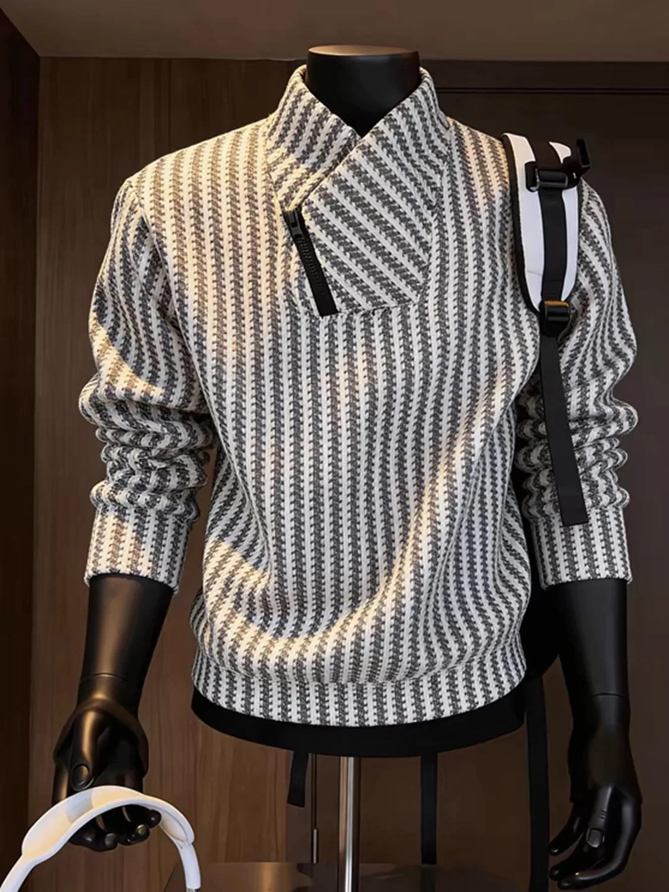 Textured zip-neck top on a mannequin