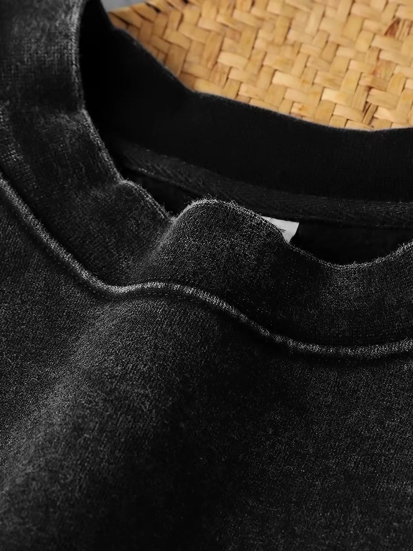 Close view of washed sweatshirt collar and fabric