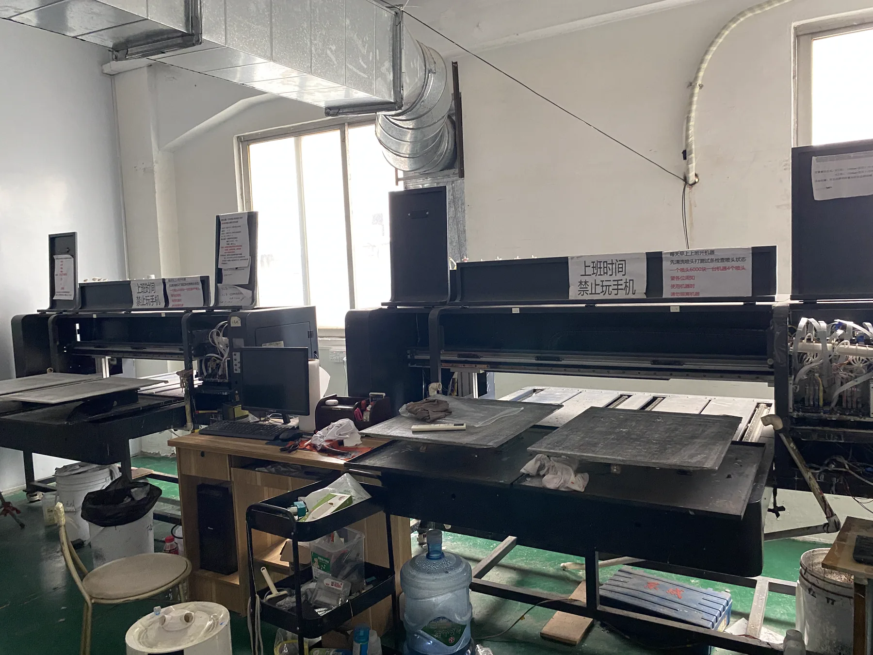 Digital white-ink printing station and garment loading worktable