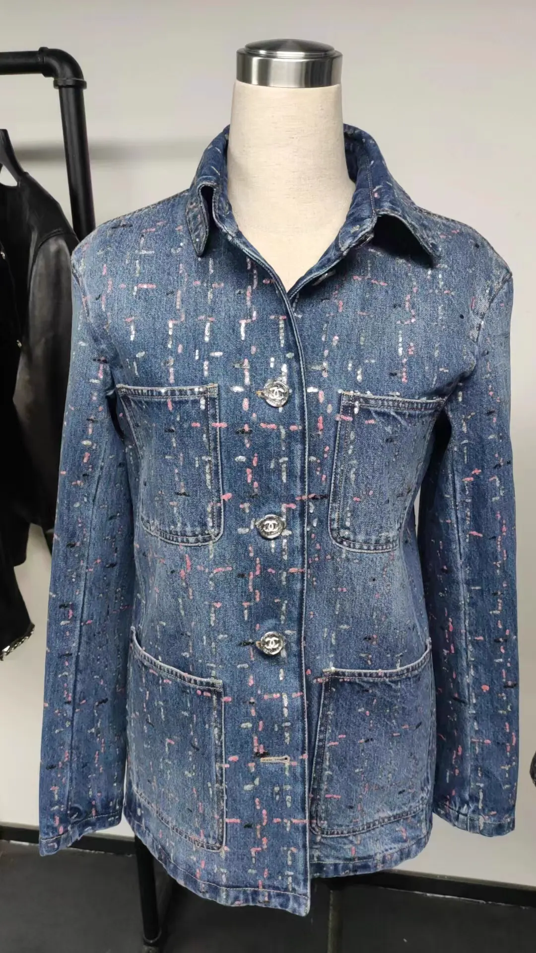 Denim garment with specialty handwork treatment