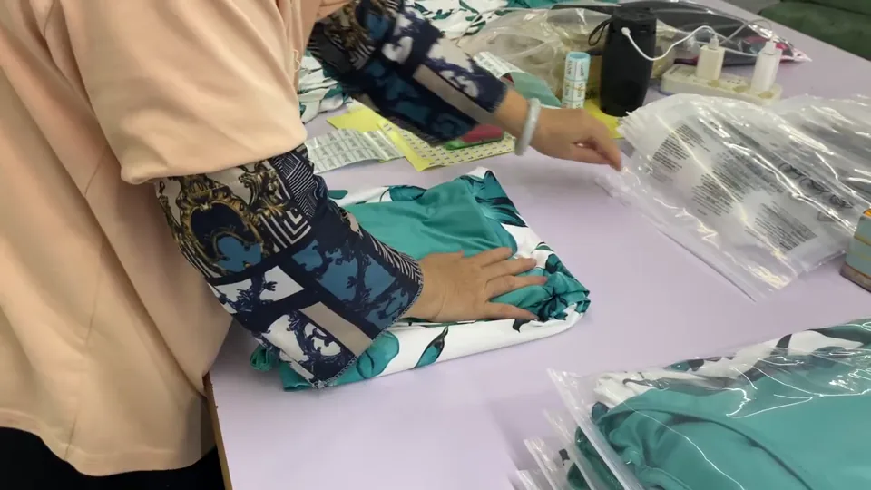 Private label garment prepared for inspection and polybag packing